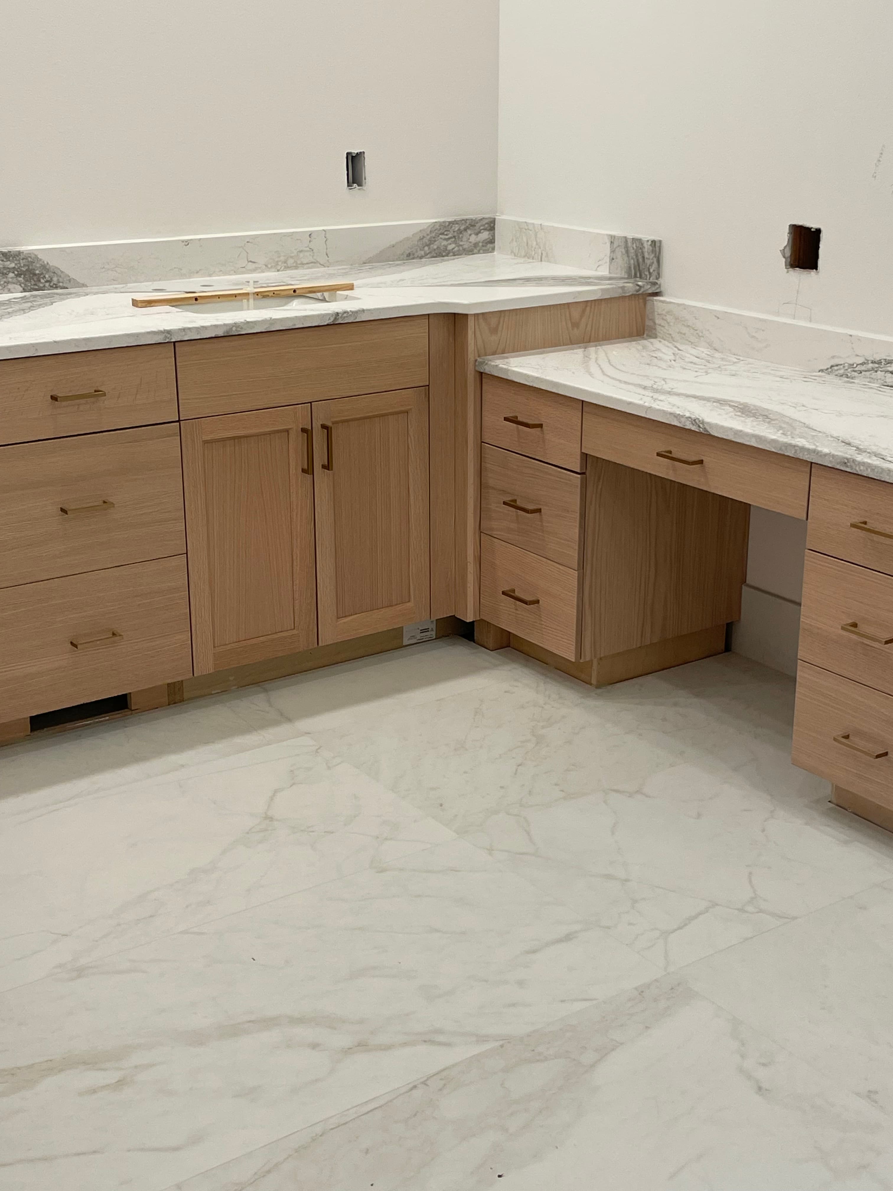 Luxury bathroom with marble tile floor and vanity